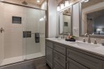 Sap-like walk in shower, vanity and separate toilet area in Master bath